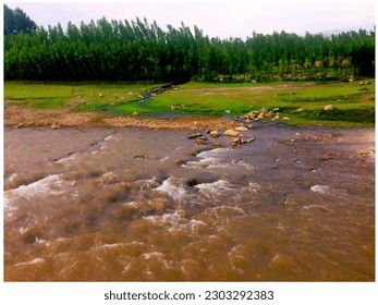 Countryside valley river stones is an isolated nature scene photo painting ,great for decoration ,travel ,book cover ,textile and fabric print ,gift card and different website and print purposes - Powered by Shutterstock