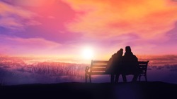 Couple On A Bench Looks At A Winter Sunset.