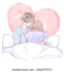 Couple Snuggling Up In Bed