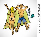 Couple sunbathing on the beach