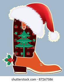Cowboy christmas card with boot and Santa's red hat .Raster