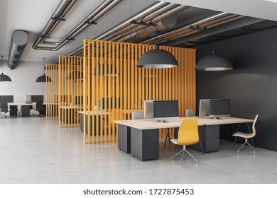 Coworking office room with computers and yellow abstract wall. Workplace and corporate concept. 3D Rendering