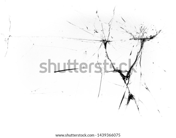Cracks in the glass. Broken\
glass on a white background, texture background design\
object