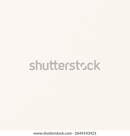 Cream background with a soft, smooth texture. The cream color adds warmth to the background, ideal for minimalist designs. Simple white background with copy space.