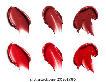 Creative advert. Assorted Lipstick smear smudge swatch isolated on white background. Cream makeup texture. Red Shades colour cosmetic product brush stroke swipe sample.  - Powered by Shutterstock