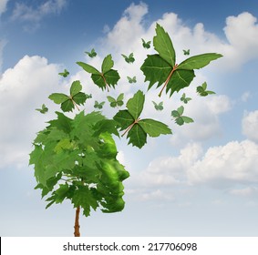 Creative communication and intelligent marketing concept as a tree shaped as a human head with flying leaves as leaf butterflies spreading the message and sharing innovative thoughts and imagination.