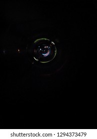 A creative pic of a empty pen and inside its the reflection of the city lights.