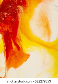 Creative red and yellow abstract hand painted background, close-up fragment of acrylic painting on canvas, wallpaper, texture. Modern art. Contemporary art.