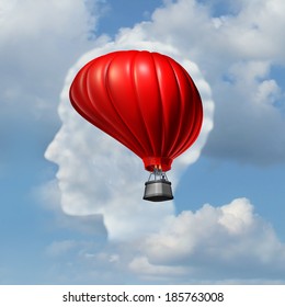 Creativity communication success with a soaring red hot air balloon shaped as a human brain over a sky background with a cloud in the shape of a head as a business metaphor for inspiration journey.