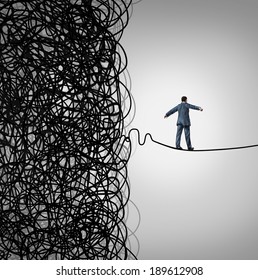 Crisis Management Business Concept As A Tightrope Walker Walking Out Of A Confused Tangled Chaos Of Wires Breaking Free To A Clear Path Of Risk Opportunity As A Metaphor For Managing Organizations.