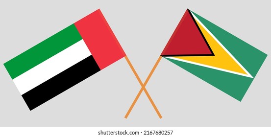 Crossed Flags Of Guyana And The United Arab Emirates. Official Colors. Correct Proportion