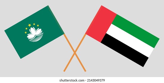 Crossed Flags Of The United Arab Emirates And Macau. Official Colors. Correct Proportion