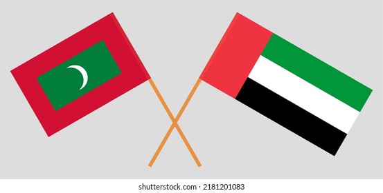 Crossed Flags Of The United Arab Emirates And Maldives. Official Colors. Correct Proportion