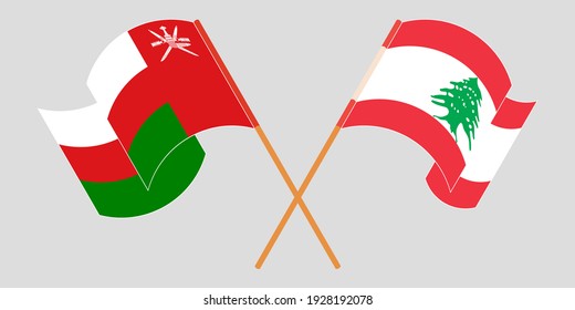 Crossed and waving flags of Lebanon and Oman