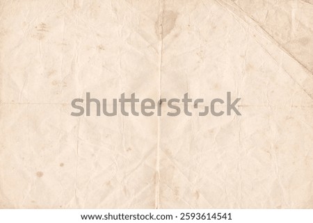 Crumpled Old Paper Texture Background. Brown folded parchment vintage paper sheet with space for text