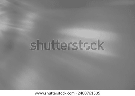  Crystal prism light refraction texture on white wall background. Organic drop diagonal holographic flare on a white wall. Water shadows for natural light overlay effects
