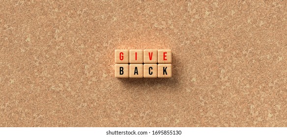 Cubes With The Message GIVE BACK On Cork Background - 3D Rendered Illustration