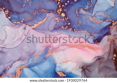 Currents of translucent hues, snaking metallic swirls, and foamy sprays of color shape the landscape of these free-flowing textures. Natural luxury abstract fluid art painting in alcohol ink technique