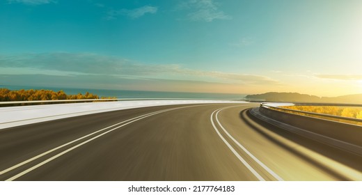 Curvy Highway With Beautiful Seascape Background View Moving Forward Motion Background,sunrise Scene. 3d Rendering