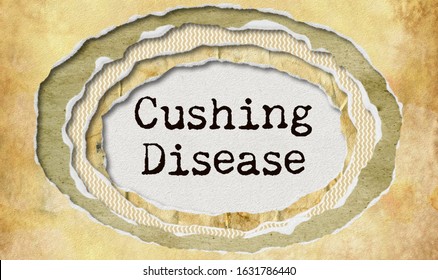 Cushing disease - typewritten word in ragged paper hole background -  Cushing's syndrome - concept tattered illustration
