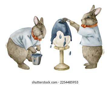 Cute bunnies paint an Easter egg with blue paint. Hand drawn watercolor illustration isolated on white background for cards, invitations, decoration, wall decor, congratulations, packaging, postcards