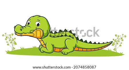 The cute crocodile is laying down in the garden of illustration