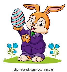 The cute rabbit is holding the easter egg of illustration