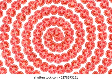 Cute Round Slices Of Tomatoes In The Form Of A Spiral Or Helix Pattern. Background Top View Cut In Half Tomato.