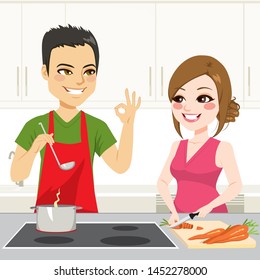 Cute young couple cooking a stew together on kitchen - Powered by Shutterstock