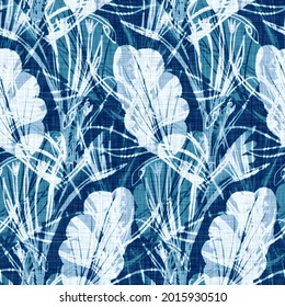 Cyanotypes blue white botanical linen texture. Faux photographic leaf sun print effect for trendy out of focus fashion swatch. Mono print foliage in 2 tone color. High resolution repeat tile. 