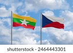 Czech Republic and Myanmar flags waving together on blue cloudy sky, two country relationship concept