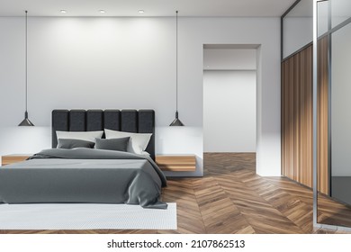 Dark Bedroom Interior With Bed, Arch, Bedside, Glass Partition And Door, White Walls And Oak Wooden Parquet Floor. Concept Of Contemporary Apartment Design. 3d Rendering