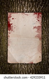 Dark Bloody Paper On A Wooden Background