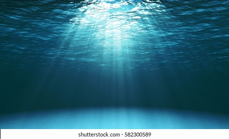 Dark blue ocean surface seen from underwater. Abstract waves underwater and rays of sunlight shining through. 3D illustration - Shutterstock ID 582300589
