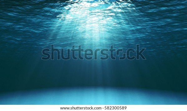 Dark blue ocean surface seen from\
underwater. Abstract waves underwater and rays of sunlight shining\
through. 3D\
illustration