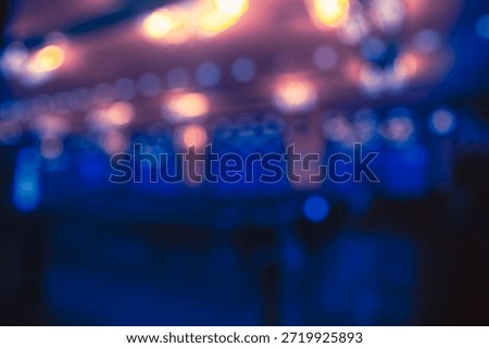 DARK BLURRED NIGHT INTERIOR BACKGROUND, OFFICE BACKDROP, ILLUMINATED CITY HALL DESIGN