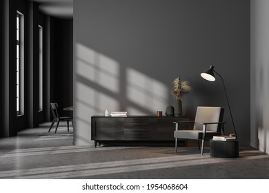 Dark contemporary waiting room interior with wooden sideboard, small coffee table and comfortable black armchair on concrete floor. Minimalist Scandinavian design. Mock up. 3d rendering - Powered by Shutterstock