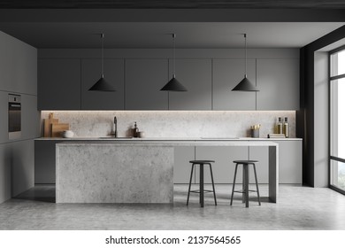 Dark cooking interior with bar chairs and countertop on grey concrete floor, sink with kitchenware, front view. Modern kitchen with window on countryside, 3D rendering