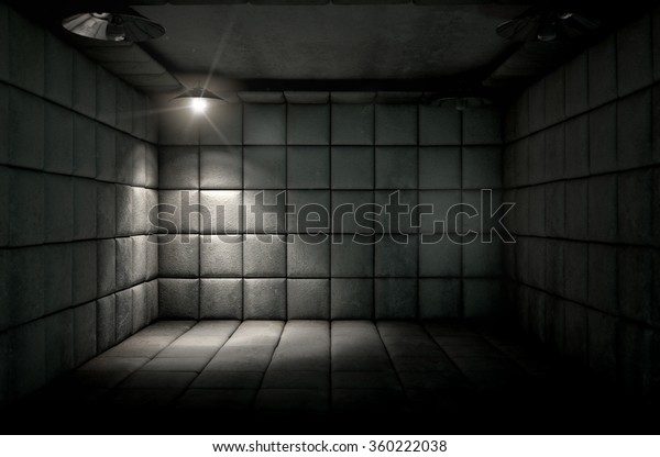 A dark dirty white padded cell in a\
mental hospital with a corner lit by a single\
spotlight