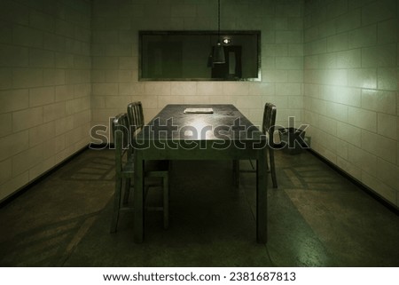 Dark, empty interrogation room seen through the one-way mirror. Investigation. 3D Illustration