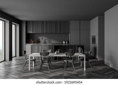 Dark Grey Kitchen Room With Kitchen Set And Dining Table On Black Parquet Floor. Eating Table With Chairs, Shelf And Window, 3D Rendering No People