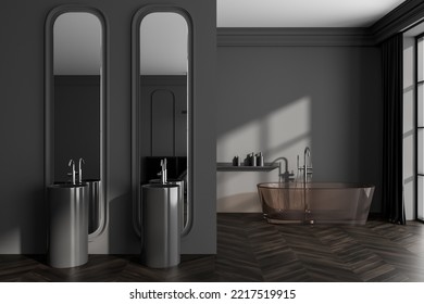 Dark Hotel Studio Interior With Double Sink And Bathtub, Hardwood Floor. Sleeping Area In Mirror Reflection And Window. Mockup Copy Space Wall. 3D Rendering