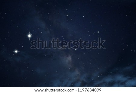 Dark interstellar space. 2d illustration. Stars in a deep space. Blue cold nebula. Dark night sky.