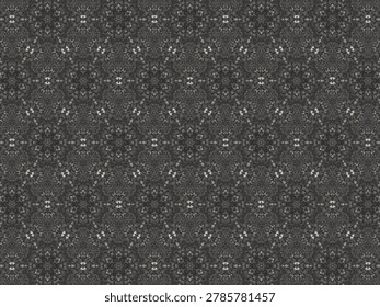 Dark, intricate patterns repeat across the surface. Symmetry creates a mesmerizing, layered effect. Subtle light highlights delicate, geometric designs. Ideal for modern, abstract