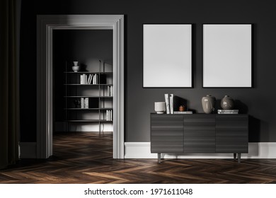 Dark Living Room With Grey Wooden Commode, Bookshelf On Background, Minimalist Decoration With Parquet Floor. Two Blank Mockup Copy Space Canvas, Art Room, 3D Rendering