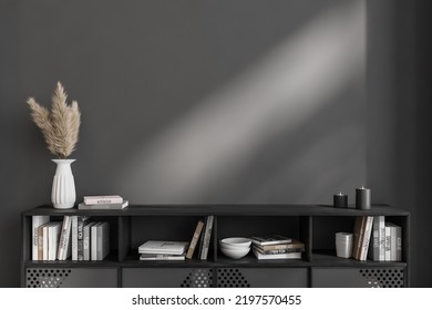 Dark Living Room Interior With Black Wooden Sideboard And Art Decoration, Exhibition Area. Mockup Copy Space Empty Wall. 3D Rendering