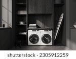 Dark modern home design laundry room interior with zone with shelves, washing machine and ironing board with towel, grey concrete floor. 3D rendering