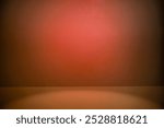 Dark orange background. Autumn background.Fall Studio.product, cosmetics, jewelry display. Showcase your product with a soft focus light. Warm orange glow backdrop. Presentation, display studio setup