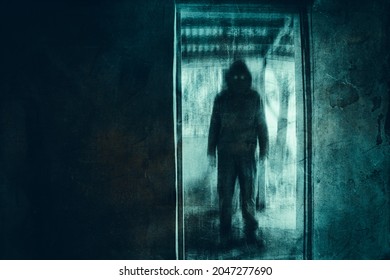 A Dark Scary Concept. Of A Mysterious Demon Figure, With Glowing Eyes Standing In A Doorway Of An Abandoned House. With A Grunge, Textured Edit. 