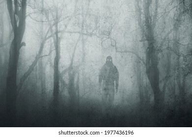 A Dark Scary Concept. Of A Mysterious Supernatural Figure, Walking Through A Forest. Silhouetted Against Trees. On A Foggy Winters Day. With A Grunge, Textured Edit. 